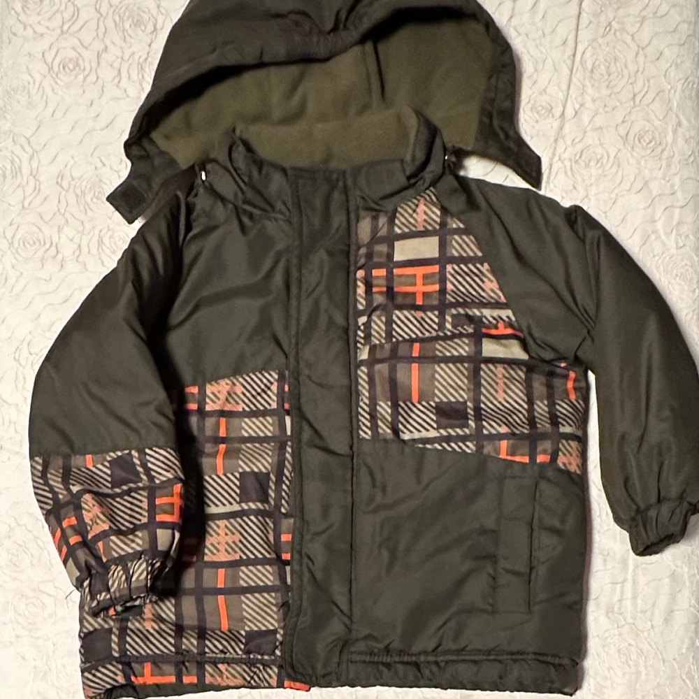 A warm coat with a hat in winter